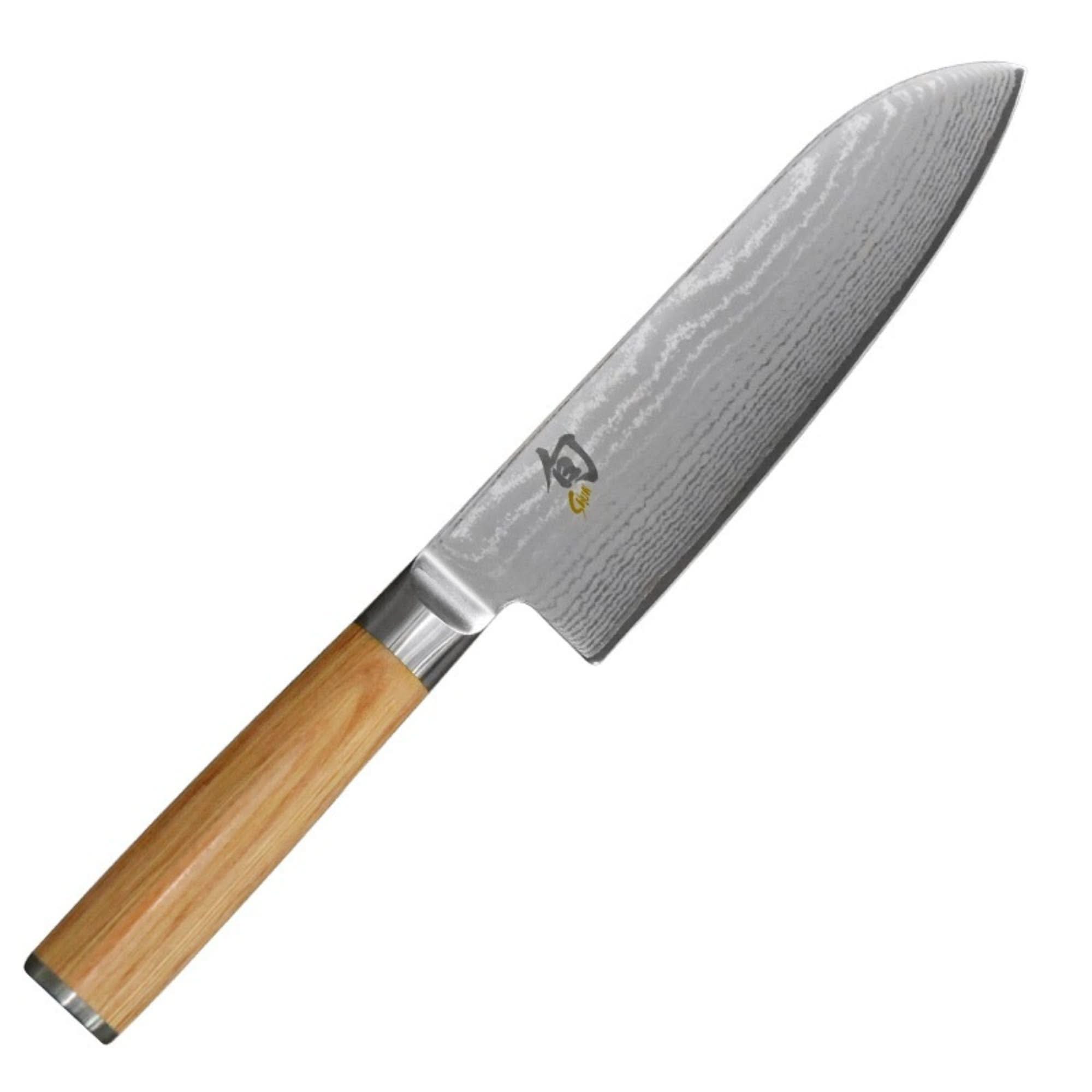 Japanese Handcrafted Damascus Steel Santoku Kitchen Knife with light wood handle.